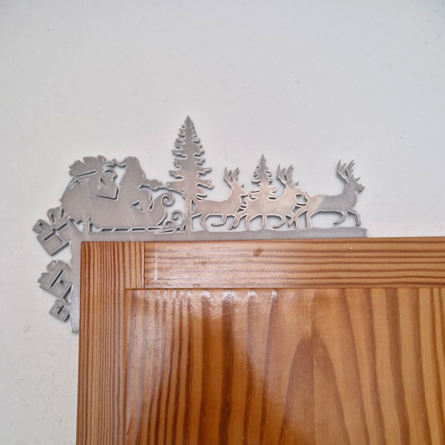 Weihnachtsdeko für Türrahmen Schlitten
